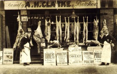 A. H. Clarke, butcher.
Shop at 109 Ordnance Road. 

Advertising plackards include "Useful Presents / OUR CHOICE FOR CHRISTMAS"; "CHRISTMAS / PLUMP! / YOUNG! / CHEAP! / POULTRY"; "FINE WILD RABBITS"; "PIGS FRYS  6d"
Keywords: 1910s;butchers;shops;retail