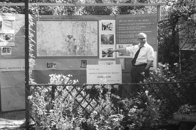 Briefing for EPS stand at the Town Show, 1963
Tony Lane with the EPS stand erected in his garden to brief helpers before the show. - [i]Fighting for the future[/i], page 272.
Keywords: Enfield Preservation Society;Town Show