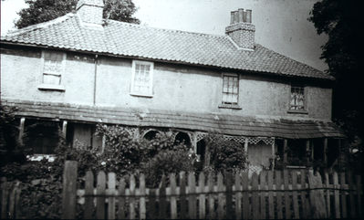 Cherry Orchard Cottages
Not certain where these were, but [i]A history of Enfield[/i] vol.3 has "Cherry Orchard Lane [i]see[/i] Churchbury Lane", so presumably near there. Image from a glass slide.
Keywords: houses