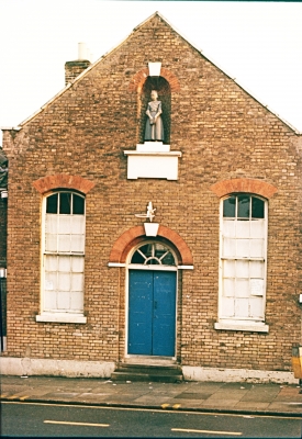 Charity School, Church Street, Edmonton
Single storey building, with a central arched doorway to the street and sash windows to either side. Above the doorway is a statuette of a female pupil. The condition of the building is slowly deteriorating and the former use is unable to provide adequate income for its upkeep. An Historic England funded Conservation Management Plan, condition survey and options appraisal have been produced. Discussions have begun with potential new users. - [URL=https://historicengland.org.uk/advice/heritage-at-risk/search-register/list-entry/1255213]Historic England Heritage at Risk Register[/URL]
Keywords: listed buildings;sculpture;schools;Grade II listed