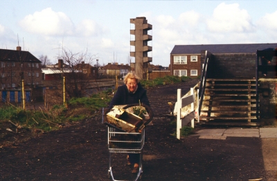 Clearing litter at Rangers Boys' Club, Carterhatch Lane, 1983
Hilda Dollery, member of EPS Council of Management and secretary of the Enfield Lock Village Clean-up Campaign, with a trolley of collected litter.
Keywords: 1980s;litter;LP1