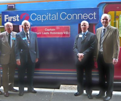 Gordon Hill centenary train naming event
Enfield railway historians:
    
     Standing to the left of the train name (left to right) - John Rowe and Roger Elkin.
 
     Standing to the right of the train name (left to right) - Dave Cockle and Peter Dace.
Keywords: GNR centenary