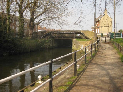 River Lee Navigation at Enfield Lock
View northwards from just south of Enfield Lock, which is immediately beyond the bridge shown. The building on the right is the lock-keeper's cottage.
