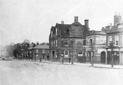 Greyhound Inn and old police station
The Greyhound was demolished in 1897 and the site is now occupied by Barclay's Bank. The old police station to its right is now known as the Old Vestry Offices, and is now the office of the Old Enfield Charitable Trust. 

[i]Reproduction right held by Enfield Local Studies Library and Archive.[/i]
Keywords: 19th century;pubs;police stations;Church Street