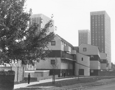 Victoria Road, Edmonton
I believe it is Victoria Road Edmonton, shot from the Church Street end heading towards Pymmes Park. Tower blocks flats were built in the 1960s just behind the Victoria Road garage which was opened by Bruce Forsyth whose family had a garage in Victoria Road. -  [i]Ian A Johnson[/i]
I think this could be sixth avenue Bush Hill Park - [i]Walters[/i]
This is Victoria Road, Edmonton - [i]Tom[/i]
Keywords: residential buildings;Lower Edmonton