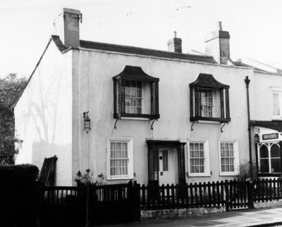 Brigadier Hill, no. 30, St. Faith's Cottage
Listed Grade II. No.30, St. Faith's Cottage, 18th century, with tented window canopies at first floor level. - [i]Treasures of Enfield[/i] p.96. 
Photograph taken for Heritage of Enfield exhibition, 1970.
Keywords: windows;porches;Grade II listed;Grade II listed