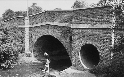 Maiden's Bridge
Built in 1761, The upper parts were rebuilt in 1968 after extensive damage by a lorry. A bridge was recorded here in medieval times, with an adjacent water mill. - [i]Treasures of Enfield[/i], p58.

This picture was in Enfield Camera Club 1980 competition and 1981 exhibition.
Keywords: bridges;streams