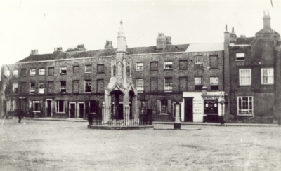 Marketplace, about 1890
Market cross and pump with houses on the east side. Shop of Blake & Co. has wording "Wine and spirit merchants and wholesale beer bottlers".
Keywords: 1890;shops;pumps;market crosses;market places