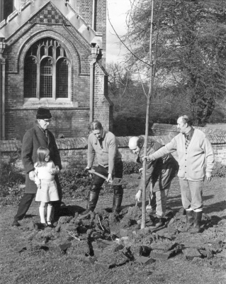 Tree planting at Jesus Church on Silver Jubilee Day, 19th March 1977
[i]Note on back of print read "A. E. Usher" but it is not clear whether he is one of the people shown or perhaps the photographer.[/i]
Keywords: 1970s;churches;anniversaries;trees;LC6