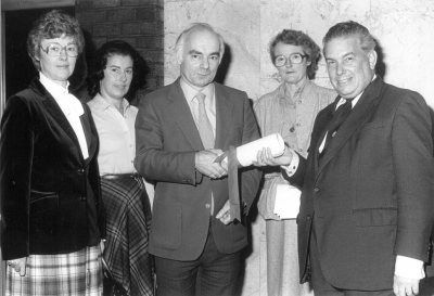 Petition of 1500 signatures being handed over on 2nd November 1982
Petition opposing G.L.C. plans for a contra-flow bus lane in Enfield Town. From left to right: Pam Mills (Publicity Secretary), Irene Smith (Hon. Secretary), Alan Skilton (Chairman), Valerie Carter (Publicity Chairman and Vice President), Councillor John Bowyer.
Keywords: 1980s;petitions;roads and streets;councillors;events;road transport