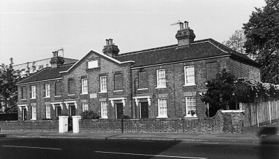 Wright's Almshouses, 346 to 356 Hertford Road
The stone tablet on the pediment above the four projecting centre bays contains the inscription 'These almshouses were erected and endowed by Mr Charles Wright of Enfield Highway for the support of six poor women'. [i]Treasures of Enfield[/i] page 35.
Keywords: almshouses