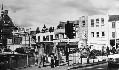 The Town, from London Road, 1975
Keywords: fountains;shops