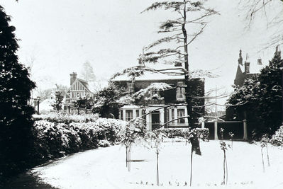 Hargrave House
Winter scene, with snow lying, from across the garden.
Comment from Daren Gordelier: "There was a Hargrave House in Gentleman's Row, it is listed on the 1891,1901 and 1911 Census. It stood next to Little Park later to be renamed Public Offices and No. 5 Gentleman's Row which adopted the name Little Park and was owned by the Leggatt family. The house was demolished around 1927 and the extension to No.5 was built to house the "Tudor Room" from Enfield Palace when that was demolished in 1927/28."
Keywords: houses