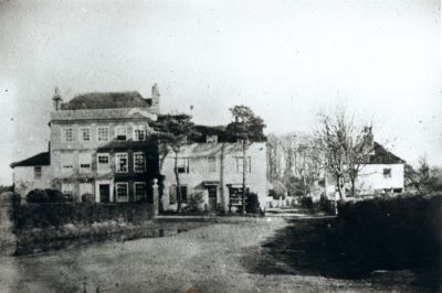 Wood House and Ivy House
At junction of Chase Side and Parsonage Lane, which runs to the right of the weatherboarded Wood House at the centre of the picture. Ivy House is on the left. These buildings were demolished in 1905 after being damaged by a fire. Margetson's Pond is on the left, filled in around 1906. - [i]History of Enfield, vol.2, p.87-90.[/i]
Keywords: houses;19th century;weatherboarding;ponds;demolished buildings