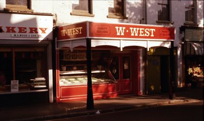 W. West, butchers, 181 Chase Side, 1977
Opposite St Michael's church.
Keywords: shops;butchers