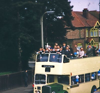 Enfield Football Club victory celebration, 1967.
On route to the Civic Centre after winning the FA amateur cup. In the Baker Street or Parsonage Lane area.
Keywords: 1960s;buses;events;sports;football