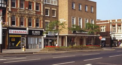 NatWest Bank and adjacent shops, The Town, June 1983
Keywords: buildings;banks;1980s;flowers