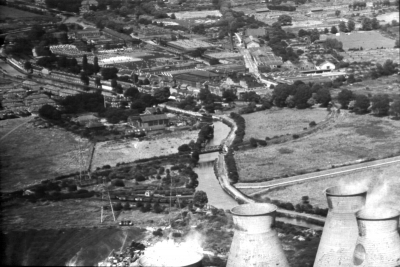 Aerial view of RSAF
Shows cooling towers of Brimsdown power station and the railway branch to the RSAF with bridge crossing the Lea Navigation.
Keywords: Royal Small Arms Factory;rail transport;canals;factories;industry;power stations;aerial;RSAF;cooling towers