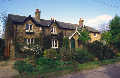 Pair of houses, nos. 5 and 6 Burnt Farm Ride 
This looks as though it was originally the same as the adjacent building, "Willow Cottage", with the chimneys at the gable ends, but has had extensions built on at each side.
Keywords: houses