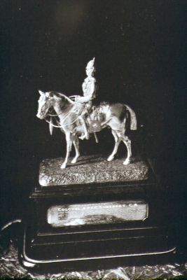 Statuette of Col. Somerset on horseback
Sir Alfred Plantagenet Frederick Charles Somerset, 1829-1915, inherited and lived at Enfield Court. "A keen equestrian, he was Master of the Hertfordshire Fox Hounds before becoming Master of the Enfield Staghounds, forming the pack in 1885. He kennelled the hounds in the grounds of Enfield Court." - [i]Daren Gordelier, EHHS Newsletter, March 2012, p.6[/i]
Keywords: people;sculpture;horses;silverware