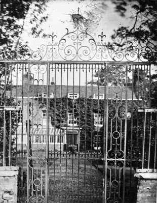 The Rectory, gates and house
Slide has annotation "Not original gates". The parsonage or Rectory House, at the corner of Parsonage Lane and Baker Street, was set in grounds of some six acres which stretched westward almost to the edge of the Chase - [i]History of Enfield[/i], vol.1, p.47. Demolished in 1929. 
Keywords: gateways;demolished buildings;historic houses