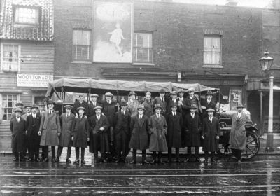 Wootton & Co., works outing, 1925
Outing in a Meeson coach. Printed in [i]A history of Enfield[/i], vol.3, p.76, which states: "At Ponders End High Street, behind the Technical Institute, Messrs Wootton's factory produced electrical woodwork, meter boards, sunk switches and the walnut frames used by MK Electric at Edmonton. The business was set up in 1919 from men formerly employed as a team at Ediswan's under Charlie  Wootton."
Keywords: industry;1920s