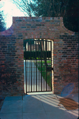 Gateway to St. Andrew's parish centre
Stone tablet on the other side reads "This gateway was erected by the Enfield Preservation Society in memory of Clayton Arburthnot Lane TD, 1903-1975". 
Keywords: gateways