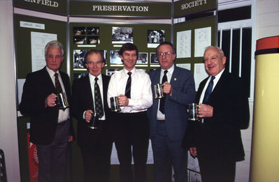Group of EPS members who had worked on restoring Jubilee Hall
Left to right: Bob Errington, Albert Cotton, Len Keeble, Stanley Smith, Wally Woodfield, with engraved pewter tankards presented on completion of Jubilee Hall restoration.
Keywords: people;Enfield Preservation Society;Jubilee Hall