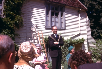 Listed building plaque being fixed to White Lodge 
Mayor Charles Wright giving a speech after the Enfield Preservation Society listed building plaque was fixed to White Lodge, Silver Street, August 1966. Carinthia Aburthnot Lane is also in the picture.
Keywords: 1960s;listed buildings;plaques;events;mayors;Enfield Preservation Society;publications;EP1