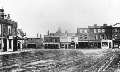 Enfield Town, east side, 1868, showing the Nag's Head inn
Southbury Road (or Bury Lane) is the narrow road to the left of the Nag's Head public house in the left centre of the picture. The Nag's Head has a sign reading "CHARRINGTON, HEAD & Co. ENTIRE". The sign on the building to its left appears to read "RAILWAY COFFEE HOUSE" (though this is not clear on the photograph). Note the condition of the road.

For a discussion of the meaning of "entire" beer, see [url=http://www.jbsumner.com/index.php?p=brewinghistory/transcripts/accum.html&a=framesoff#old]Fredrick Accum: [i]A treatise on adulterations of food[/i], 1820.[/url] 

[i]Reproduction right held by Enfield Local Studies Library and Archive.[/i]
Keywords: pubs;Southbury Road;Bury Lane;1860s;inns;coffee houses